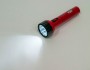 Аккумуляторный ручной фонарь красный, 9+3LED 0,7W со встроенной вилкой для подзарядки 230V/50Hz, время зарядки 12 часов, время работы 6,5 часов при обычном режиме свечения, 24 часа в режиме ночника TL042 Feron, артикул: 12957 - 